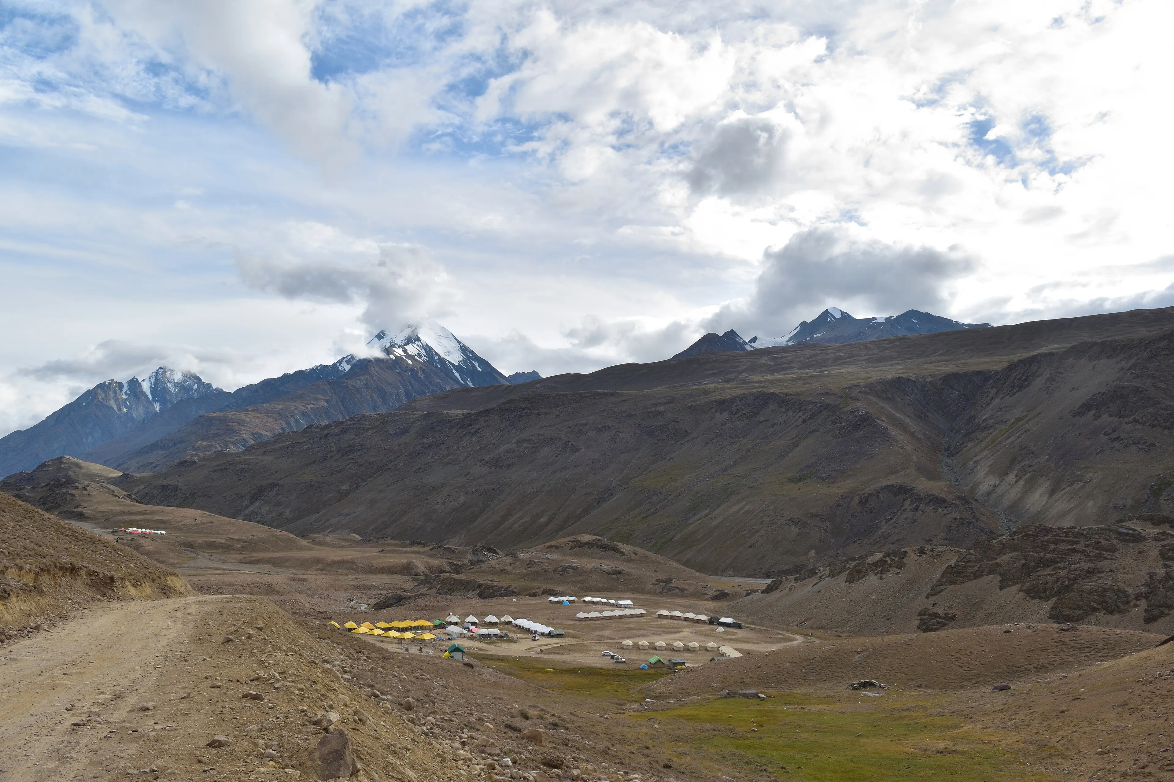 Volunteers building a greenhouse in Spiti with local families
